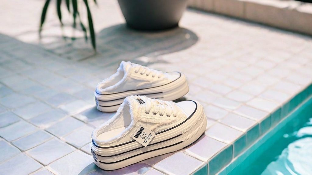 features of white slip on canvas shoes